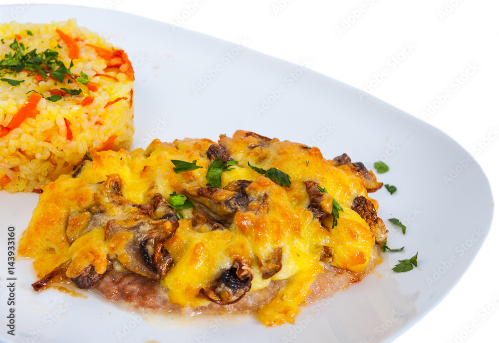 Meat under cheese and mushrooms with rice isolated on white Meat under cheese and mushrooms with rice isolated on white