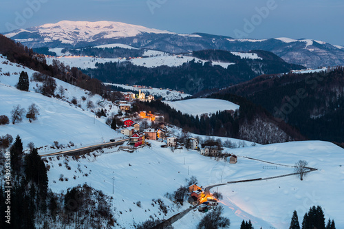 Village, Campanella, Gallio, Altopiano of Asiago, Province of Vicenza, Veneto, Italy. Mountain hamlet in winter photo