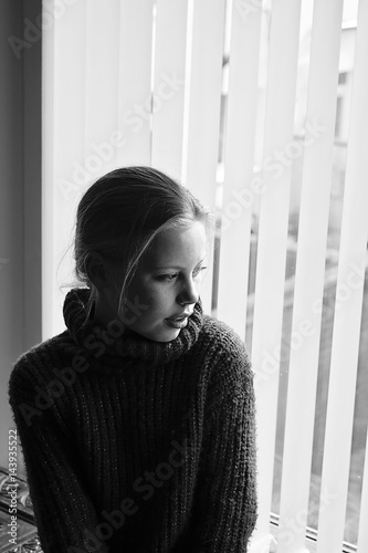 girl looking out of window