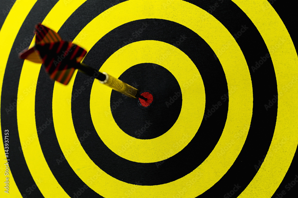 Target dart with arrow background ,metaphor to target marketing or target arrow concept. Target dart with arrow background ,metaphor to target marketing or target arrow concept.