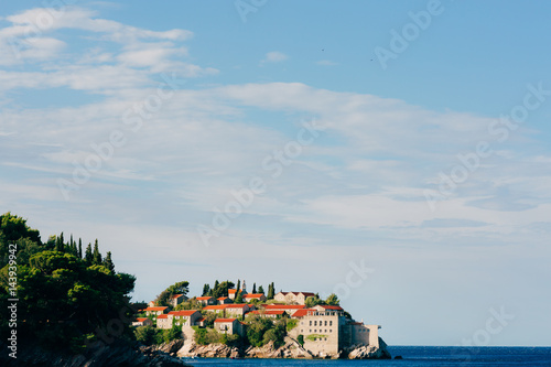 Island of Sveti Stefan, close-up of the island in the afternoon. Montenegro, the Adriatic Sea, the Balkans. © Nadtochiy
