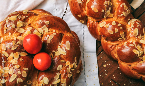 Photography Easter bread and eggs on a table - top view