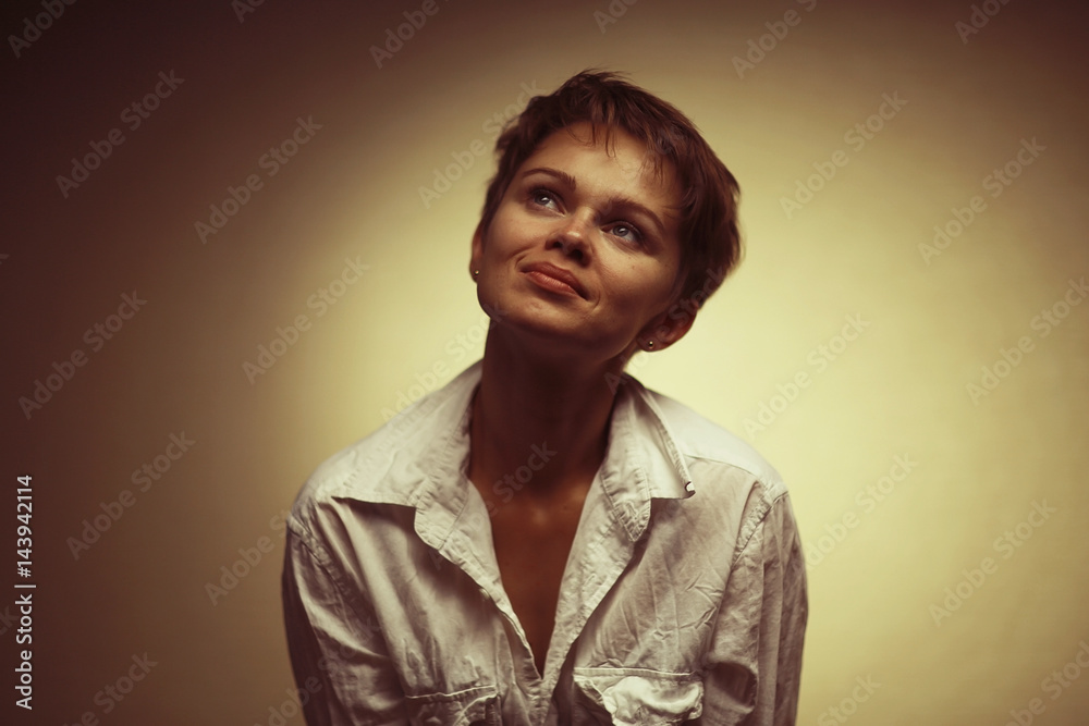 Studio portrait of a brunette with a short haircut Studio portrait of a brunette with a short haircut