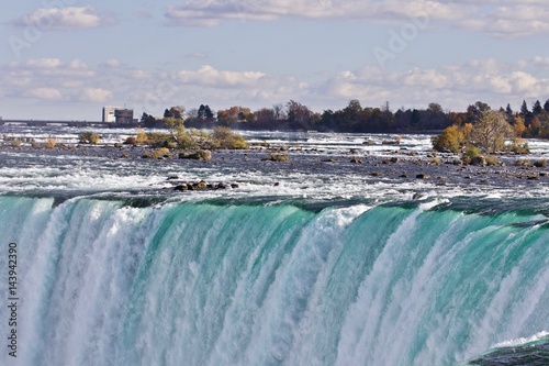 Beautiful background with amazing powerful Niagara waterfall