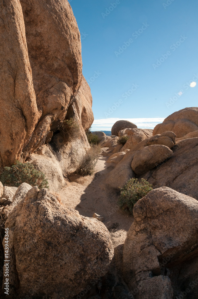 Hiking trail through boulders in southern California