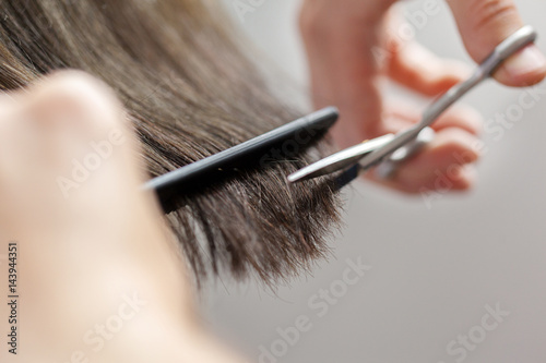 Woman does a haircut
