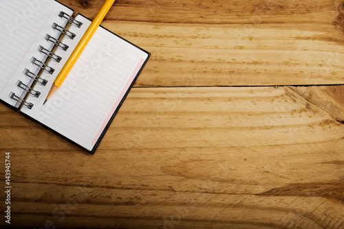 notebook, pencil in desktop