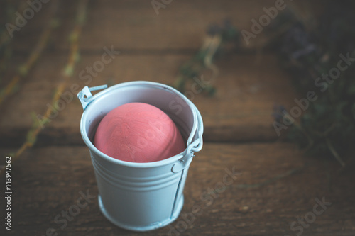 Easter eggs in colored buckets. © prokop.photo