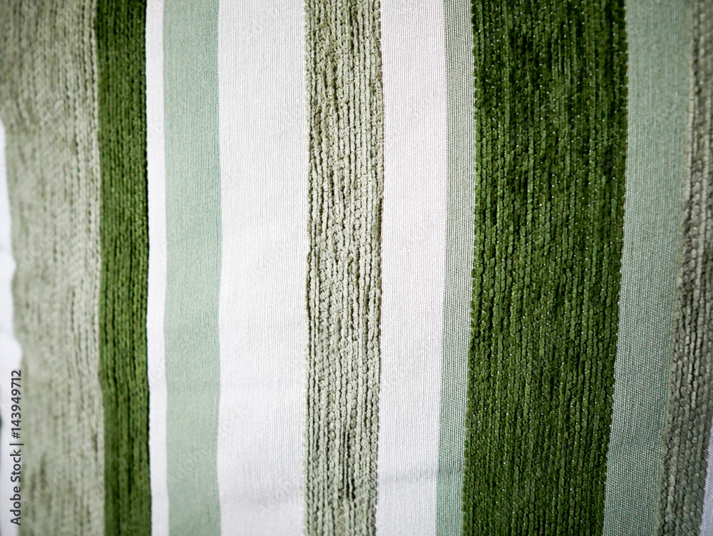 Fototapeta premium Macro of a green line pattern pillow.