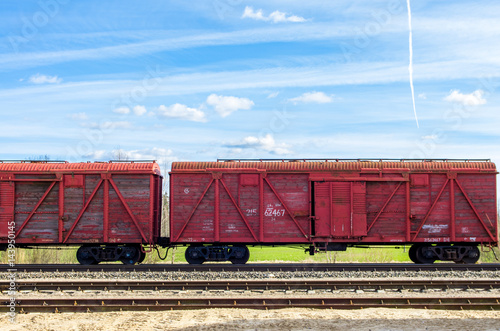 Red train wagons on railroad