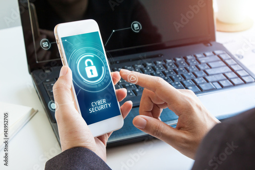 Wallpaper Mural Business, technology, internet and networking concept. businessman working on his laptop and mobile in the office select the icon security on the virtual display. Cyber security Torontodigital.ca