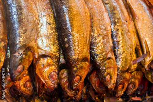  Hot smoked fish Baikal omul (Coregonus autumnalis) on the street market. Fish omul - Baikal endemic. 
