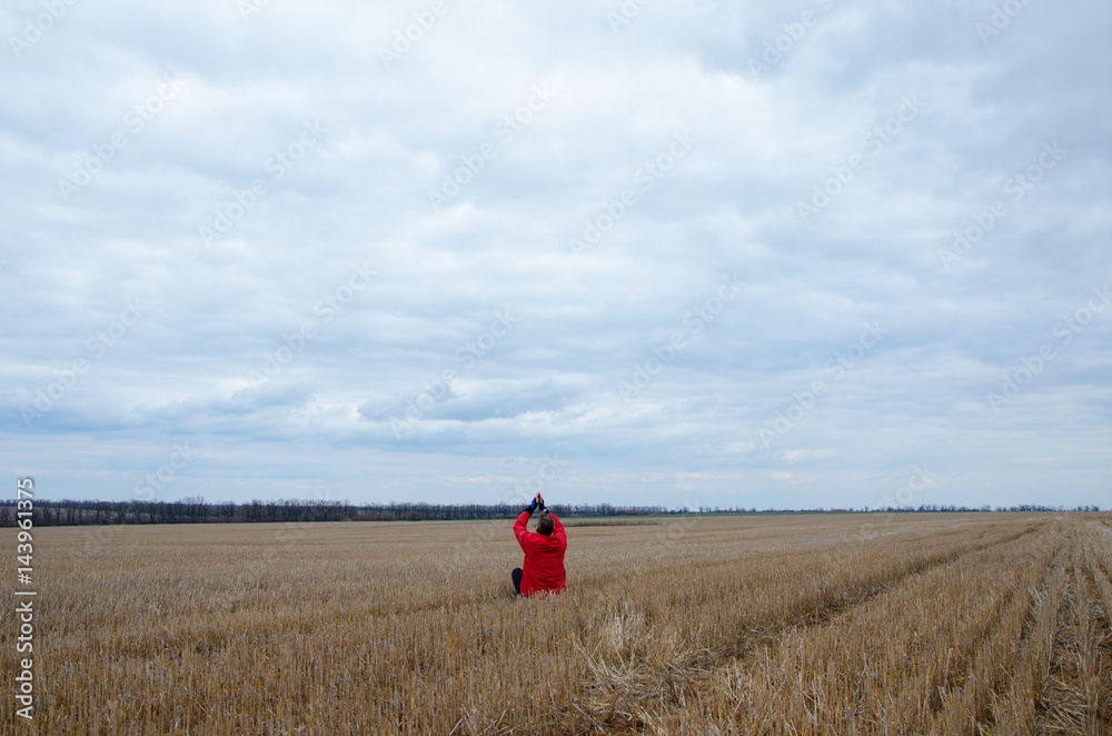 man sitting in the field man sitting in the field