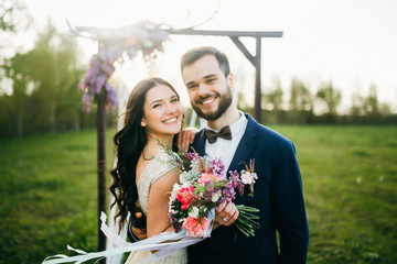 Happy bride and groom after wedding ceremony