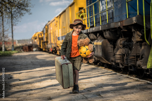boy waiting at the railway station, Vacation trip by train    © wip-studio