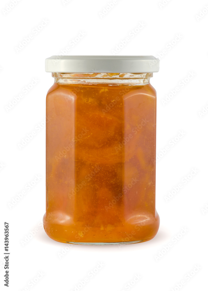 Apricot or peach jam in glass jar isolated with clipping path.