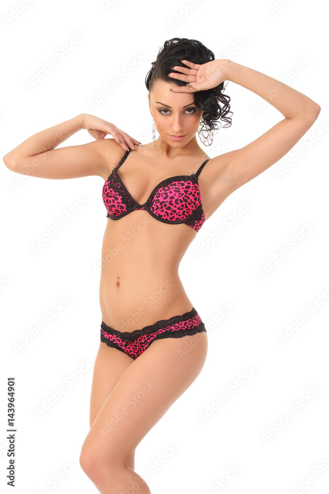 Seductive underwear model posing on white background Seductive underwear model posing on white background