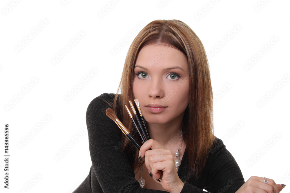 Portrait young woman holding powder brush Portrait young woman holding powder brush