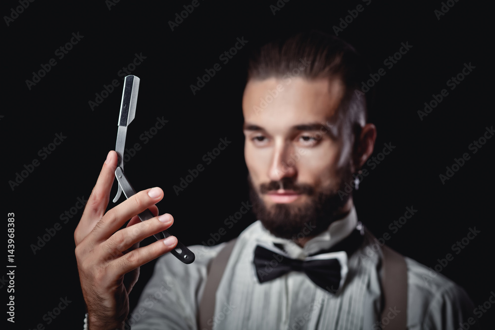 Portrait of handsome man posing for photographer in studio, Dangerous razor, Portrait of handsome man posing for photographer in studio, Dangerous razor,