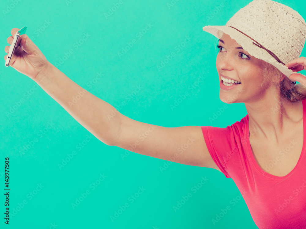 Woman taking picture of herself with phone Woman taking picture of herself with phone