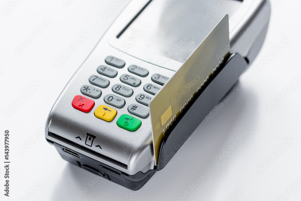 purchasing concept with card payment and terminal on table background purchasing concept with card payment and terminal on table background