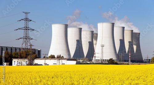  Nuclear power plant, cooling tower, field of rapeseed