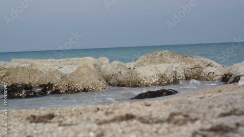 blue sea waves lapping on Mediterranean shore.