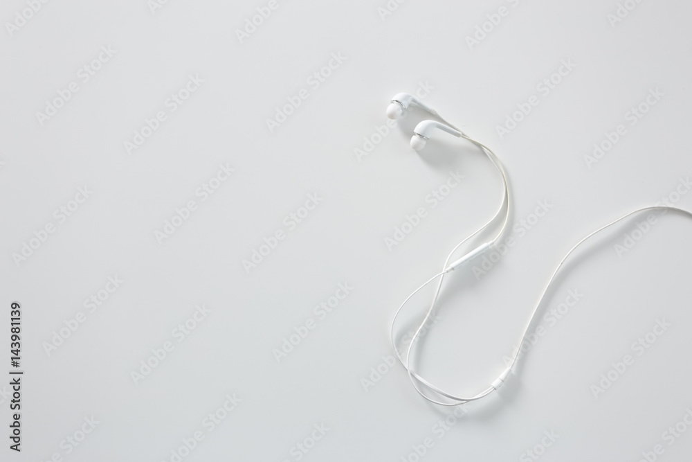 Modern portable audio earphones isolated
