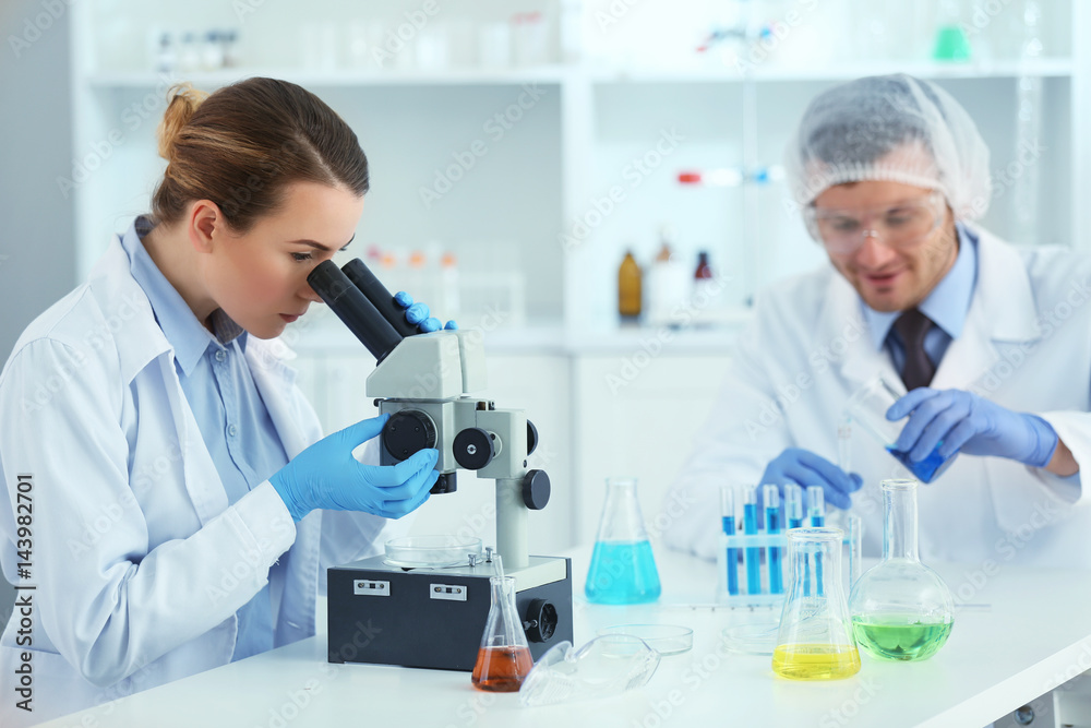 Female scientist working at laboratory Female scientist working at laboratory