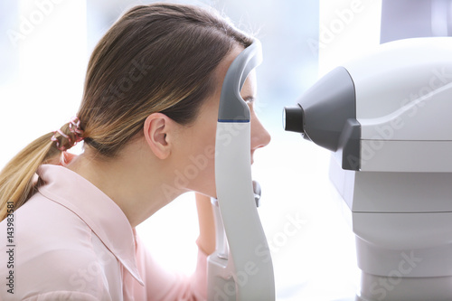 Young woman visiting an opt...