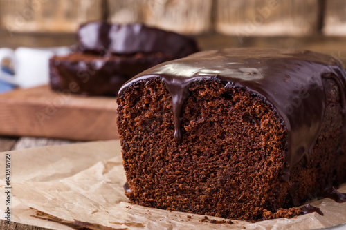 Homemade chocolate cake on wooden table