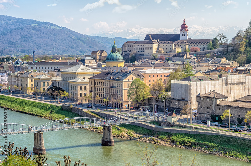 Fototapeta premium Salzburg, Austria.Panoramic view of Salzburg with Salzach river during sunny spring day 