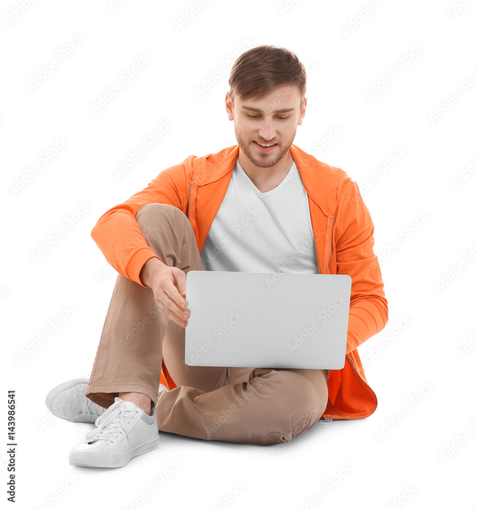 Handsome young man with laptop on white background Handsome young man with laptop on white background