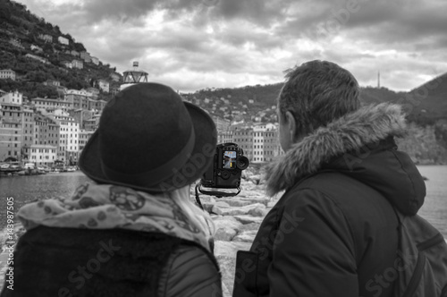 Camogli photographer couple sightseeing. Black and white photo