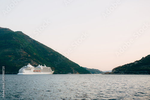 Huge cruise ship in the Bay of Kotor in Montenegro. A beautiful country to travel.