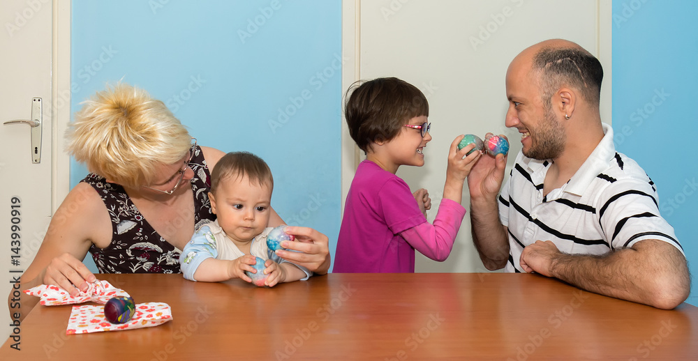 Naklejka premium Family having breakfast on Easter day
