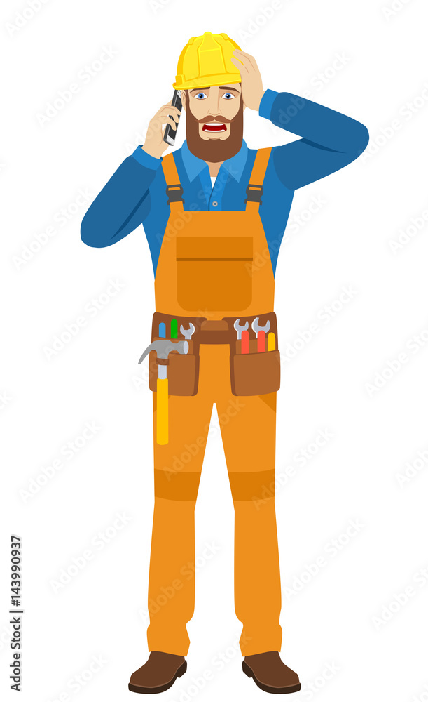 Worker talking on the mobile phone and grabbed his head Worker talking on the mobile phone and grabbed his head