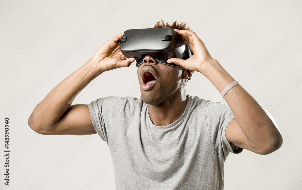 afro american man wearing virtual reality vr 360 vision goggles enjoying video game afro american man wearing virtual reality vr 360 vision goggles enjoying video game