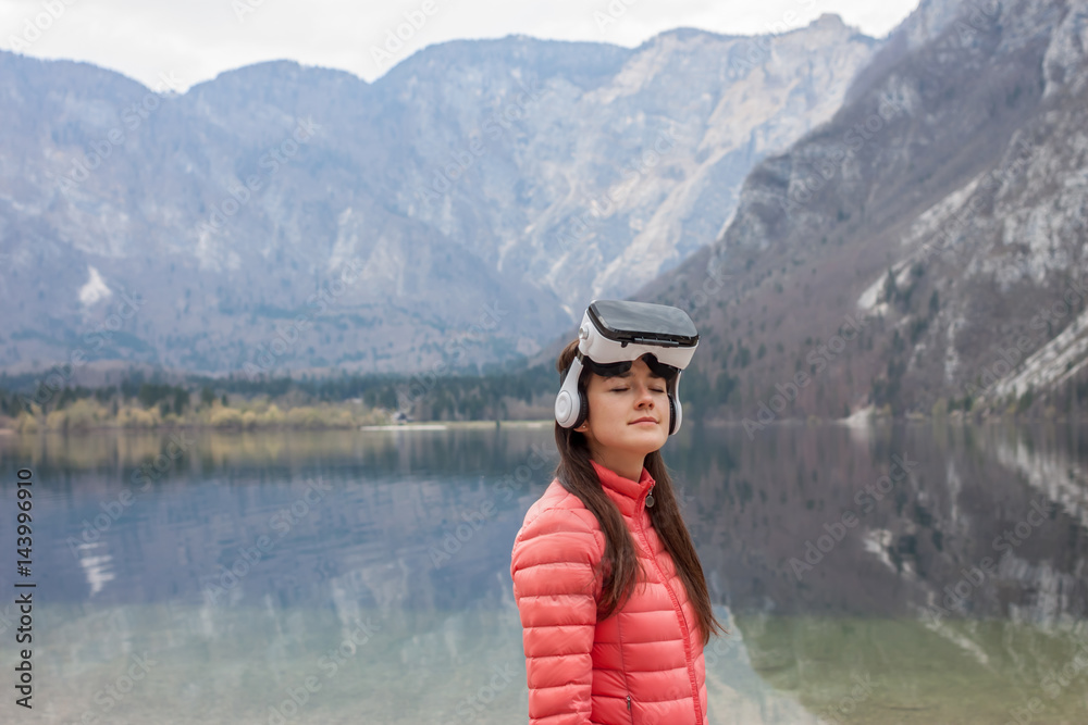 young woman in VR glasses
