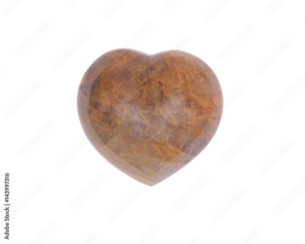 Golden healer quartz heart isolated on white background