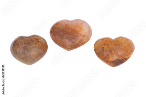 Fotografia Golden healer quartz heart isolated on white background