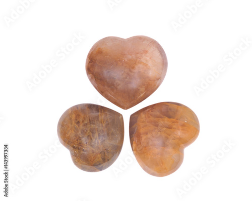Fotografia Golden healer quartz heart isolated on white background