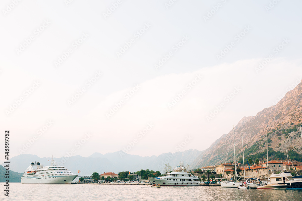 Huge cruise ship in the Bay of Kotor in Montenegro. Near the old town of Kotor. A beautiful country to travel.