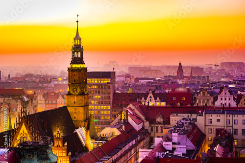 Panorama illuminated old town of Wroclaw at night. Popular travel destination in Poland. High dynamic range.