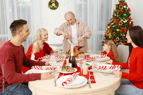 Happy family having Christm...