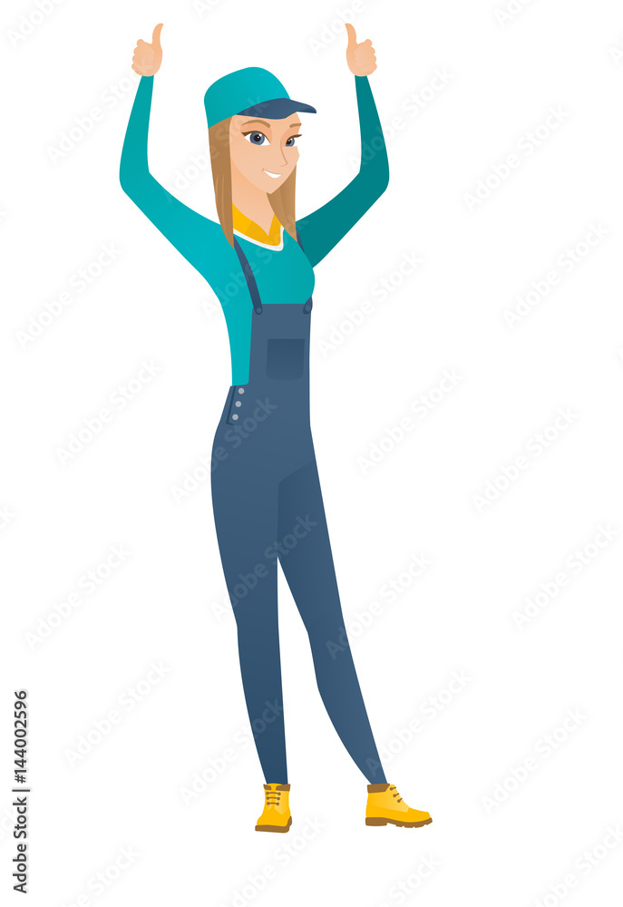 Mechanic standing with raised arms up. Mechanic standing with raised arms up.