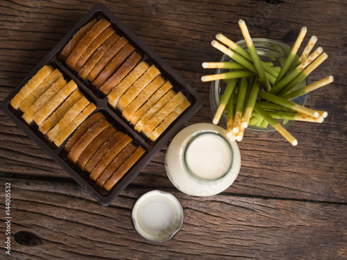 Morning with breakfast,soy milk biscuit and bread on the table topview