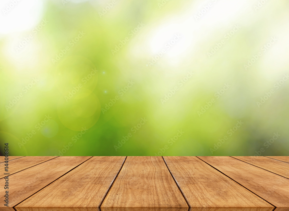 Nature spring or summer with sunlight background and wood table Nature spring or summer with sunlight background and wood table