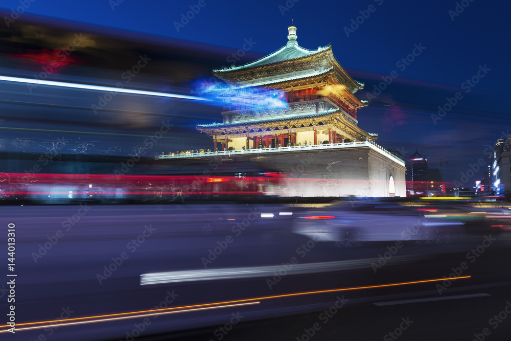 China Xi'an night, the city landmark clock tower and the light track