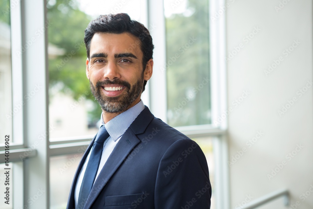 Portrait of businessman smiling Portrait of businessman smiling
